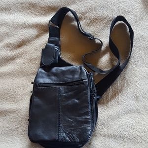 Black muti pockets,  crossbody or messenger bag